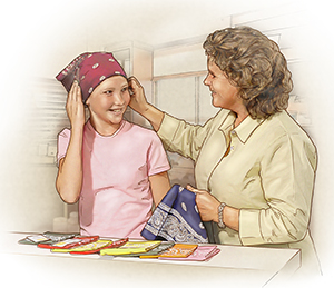 Woman and teenage girl shopping for head scarves.